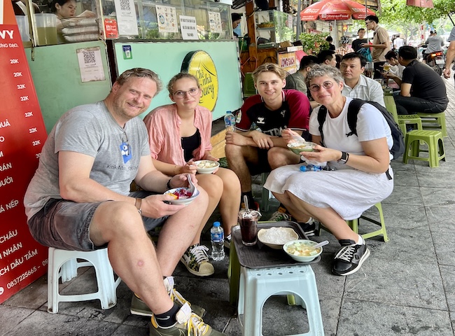 Sitting on low stools for she